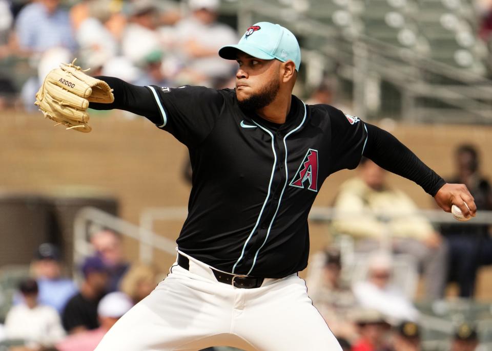 Arizona Diamondbacks pitcher Eduardo Rodriguez allows a home run to Texas Rangers Marcus Semien in the first inning during a spring training game at Salt River Fields on Feb. 27, 2024.