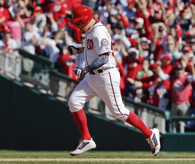 Jose Lobaton races around the bases after delivering a go-ahead three-run homer. (AP)