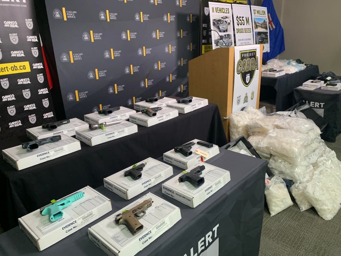 Guns and drugs seized by ALERT on display.  (Mike Symington/CBC - image credit)