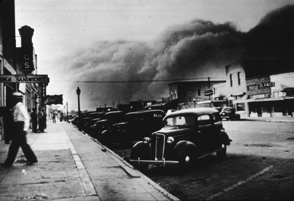 21st May 1937:  A dust storm in Elkhart, Kansas. 