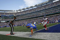 Los Angeles Rams' Cooper Kupp, center, scores a touchdown as New York Giants' Adoree' Jackson, right, looks on during the first half of an NFL football game, Sunday, Oct. 17, 2021, in East Rutherford, N.J. (AP Photo/John Munson)