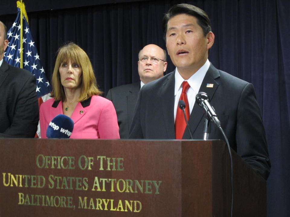 Maryland U.S. Attorney Robert Hur announces an 11-count indictment against former Baltimore Mayor Catherine Pugh at a news conference in Baltimore on Wednesday, Nov. 20, 2019. The disgraced former mayor has been charged with fraud and tax evasion involving sales of her self-published children's books. (AP Photo/Brian Witte)
