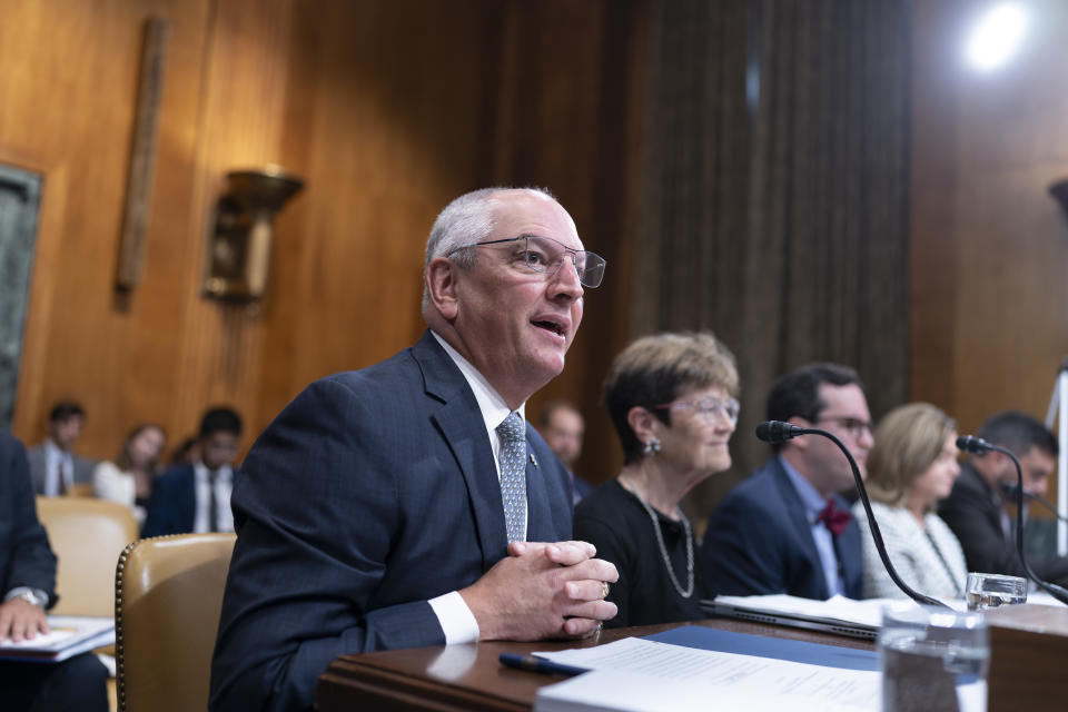 Louisiana Governor John Bel Edwards testifies as the Senate Budget holds a hearing to examine the fiscal consequences of climate change on infrastructure, at the Capitol in Washington, Wednesday, July 26, 2023. (AP Photo/J. Scott Applewhite)