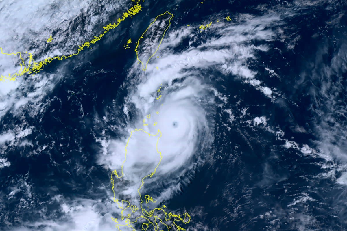 Satellite footage shows Typhoon Saola moving over Taiwan (National Institute of Information and Communications Technology (NICT))