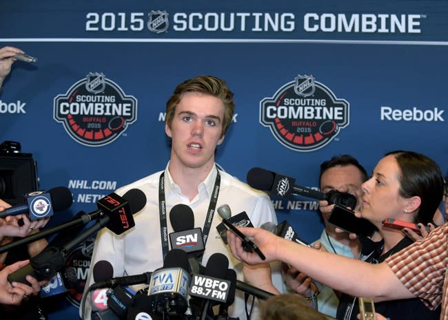 Connor McDavid pauses when he is asked about all the media attention he is getting during a news conference at the NHL Combine in Buffalo, N.Y., on June 5, 2015. Wayne Gretzky can&#39;t offer Connor McDavid much advice about how to handle the pressure of the NHL draft later this month. The Great One never went through the experience himself. But on June 26, he&#39;ll be watching with interest from his summer home in Idaho as the Edmonton Oilers, his former team, select first overall and likely take the highly touted McDavid. THE CANADIAN PRESS/AP, Gary Wiepert