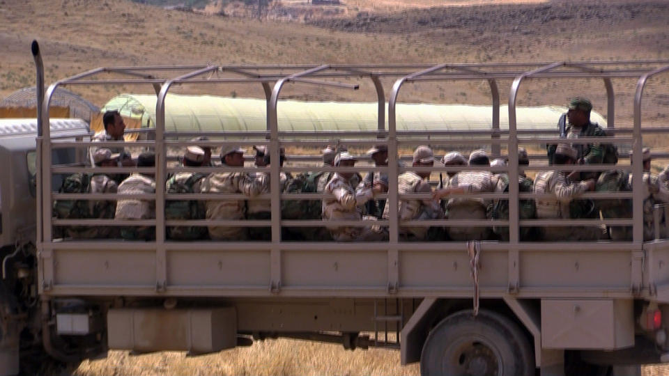 Kurdish peshmerga leave the target range for training in other parts of base. (Photo: Ash Gallagher/Yahoo News)