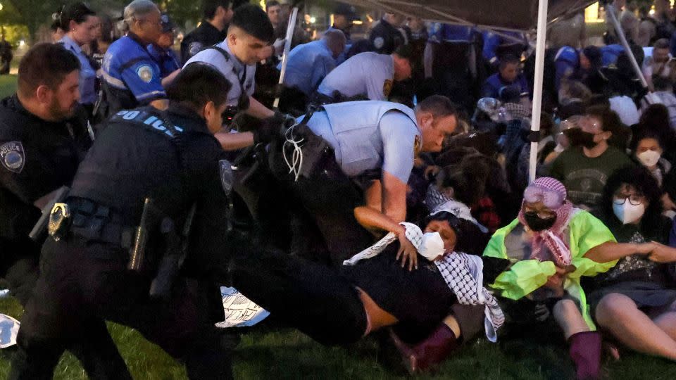 Police arrest pro-Palestinian protesters attempting to camp on Washington University's campus, Saturday, April 27, 2024, in St. Louis, Mo. - Christine Tannous/St. Louis Post-Dispatch/AP