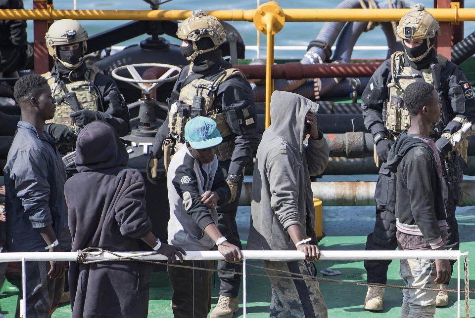 Armed forces stand onboard the Turkish oil tanker El Hiblu 1, which was hijacked by migrants, in Valletta, Malta, Thursday March 28, 2019. A Maltese special operations team on Thursday boarded a tanker that had been hijacked by migrants rescued at sea, and returned control to the captain, before escorting it to a Maltese port. (AP Photo/Rene' Rossignaud)