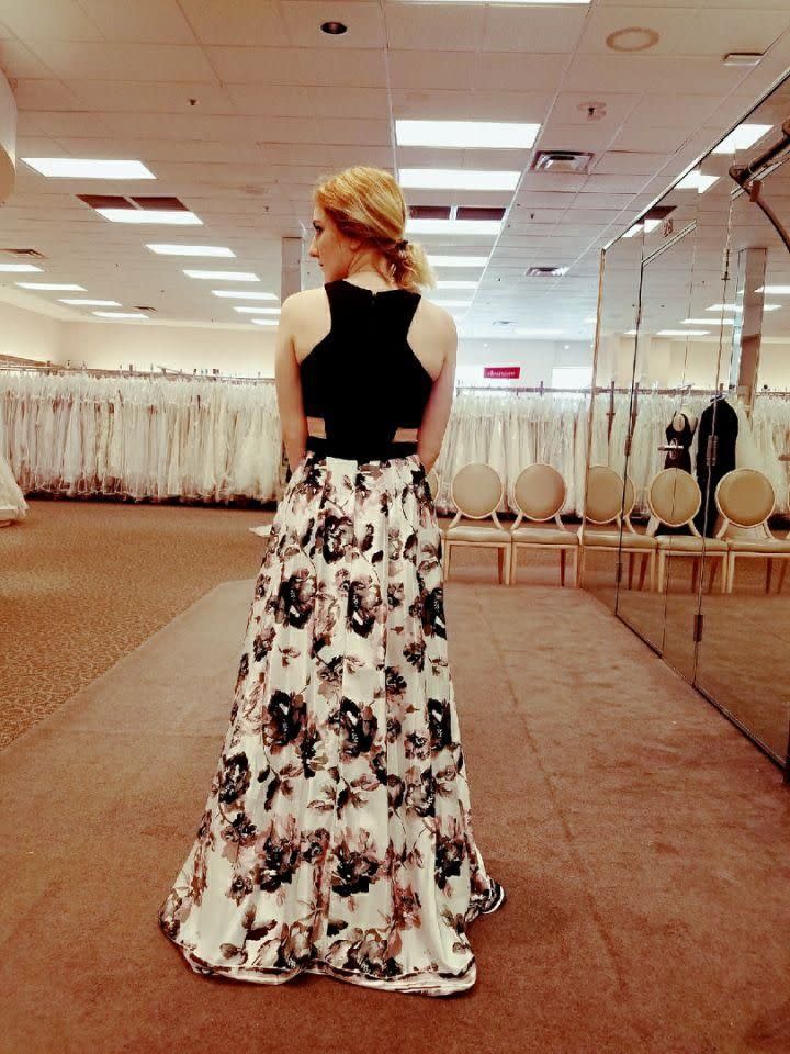 This is Josie's dress from the back, she was going for a conservative look while shopping for it.