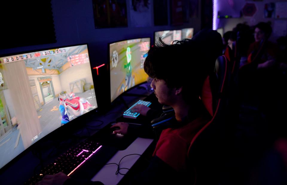 Daniel Diaz, a junior and member of the McKinley High School esports team practices at the school, Wednesday, Feb. 1, 2023.