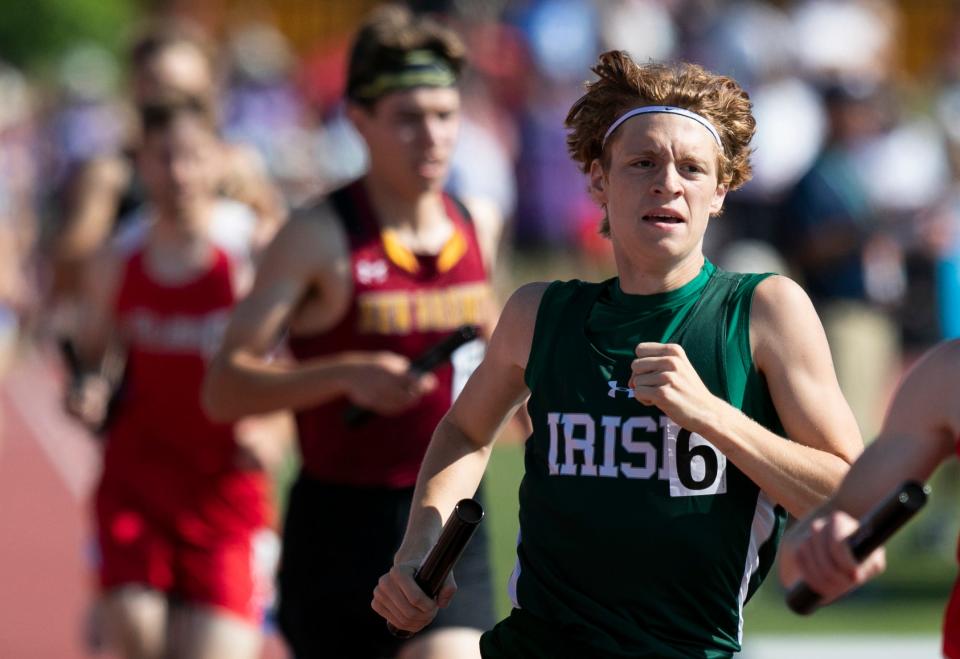 Fisher Catholic's Jack Gentile runs the last lap of the boys 4X800 meter relay during the first day of the State Track and Field at Jesse Owens Memorial Stadium at The Ohio State University on June 6, 2023 in Columbus, Ohio.