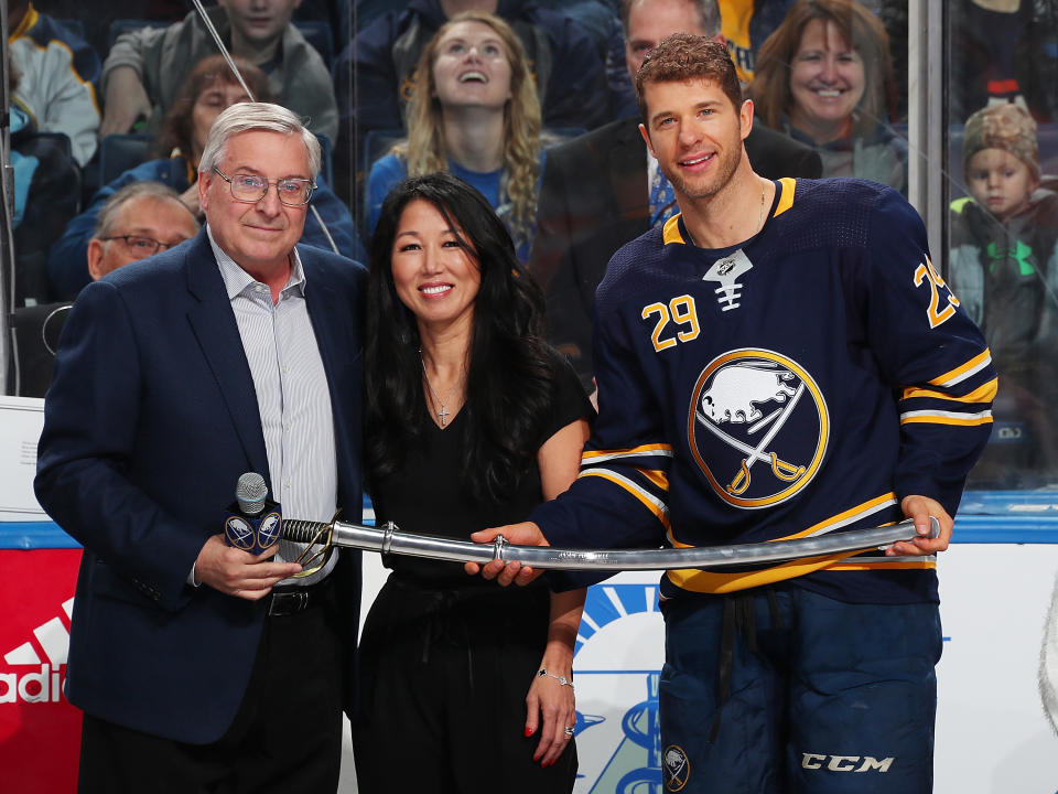 Terry and Kim Pegula, pictured here with Jason Pominville at a Buffalo Sabres game in 2018.