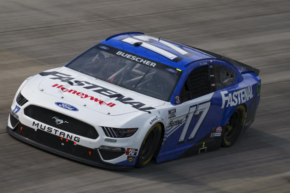 FILE - Chris Buescher drives during a NASCAR Cup Series auto race at Dover International Speedway in Dover, Del., in this, Sunday, May 16, 2021, file photo. Roush Fenway Racing on Wednesday, May 19, 2021, announced a contract extension with both driver Chris Buescher and longtime sponsor Fastenal. The deal with Fastenal was extended through the 2024 season. (AP Photo/Chris Szagola, File)