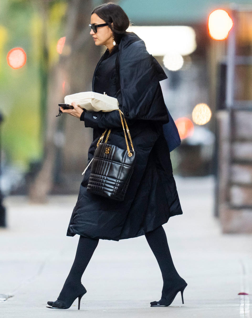 <p>Irina Shayk totes some goodies as she heads out on Thanksgiving in N.Y.C.</p>