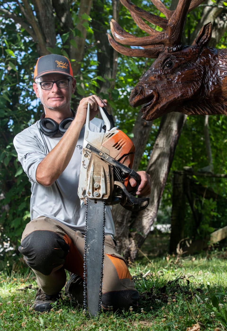 World-class chainsaw artist Abby Peterson makes a living sculpting art out of wood. Peterson lives in Webster, Ky. July 5, 2022