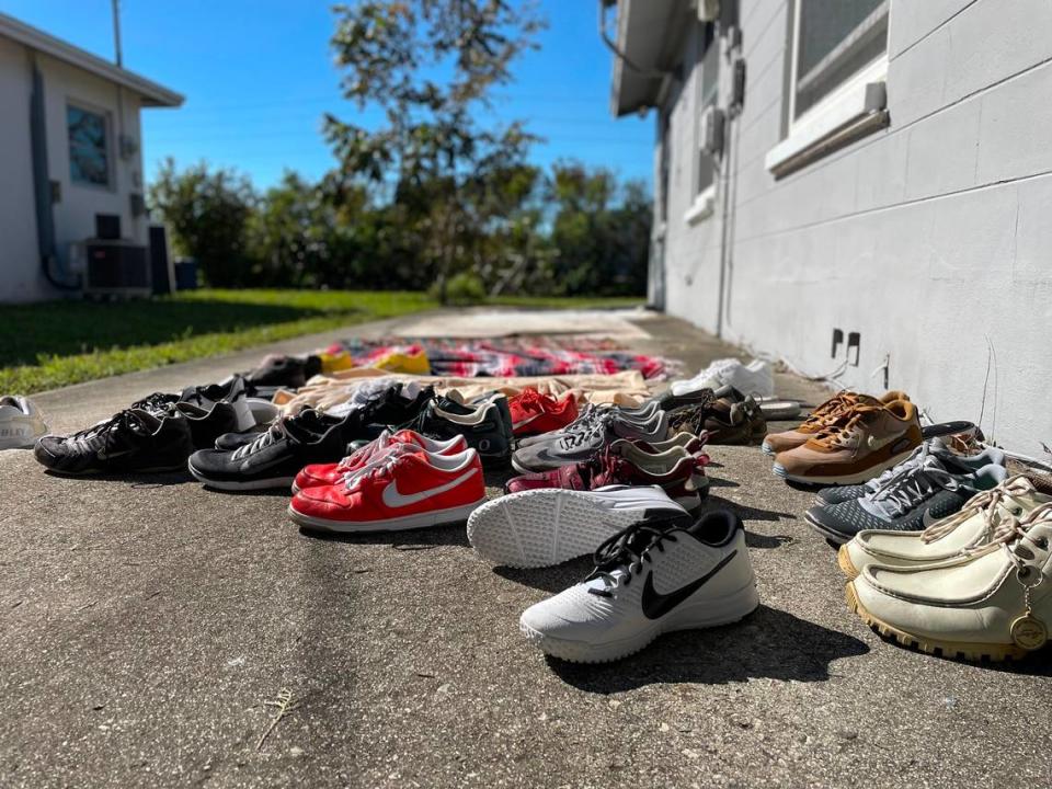 Shoes were left up to dry outside Barbara Fuller’s house at Naples’ River Park neighborhood on Saturday, Oct. 1, 2022. The area was overrun with floodwaters due to Hurricane Ian.