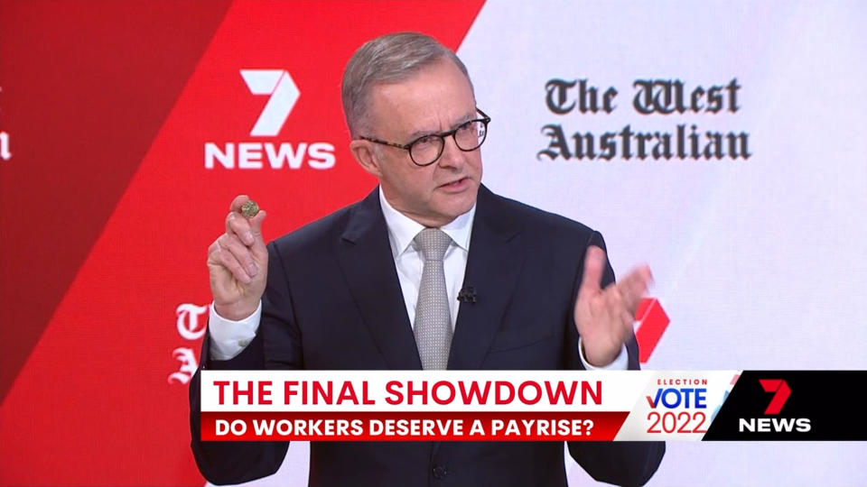 The Labor leader brought a $1 coin as a prop to make his point. Source: 7News