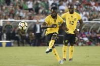 Jul 23, 2017; Pasadena, CA, USA; Jamaica defender Kemar Lawrence (20) attempts a free kick for a goal against the Mexico during the second half at Rose Bowl. Kelvin Kuo-USA TODAY Sports