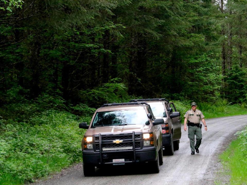 Police on the scene of the attack in North Bend, near Seattle (AP)