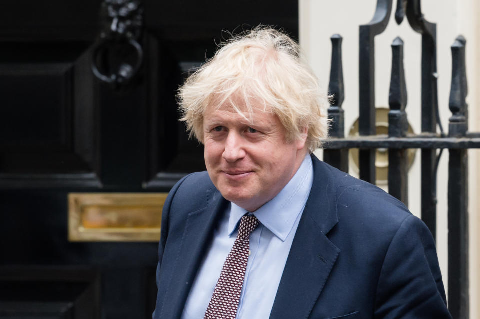 LONDON, UNITED KINGDOM - JUNE 03, 2020: British Prime Minister Boris Johnson leaves 10 Downing Street for PMQs at the House of Commons on 03 June, 2020 in London, England. The UK remains in lockdown due to the coronavirus (Covid-19) pandemic with more of the restrictions eased across England since Monday as the number of recorded daily fatalities and infection rates decline with the current UK death toll reported at 48,106 by the Office for National Statistics.- PHOTOGRAPH BY Wiktor Szymanowicz / Barcroft Studios / Future Publishing (Photo credit should read Wiktor Szymanowicz/Barcroft Media via Getty Images)