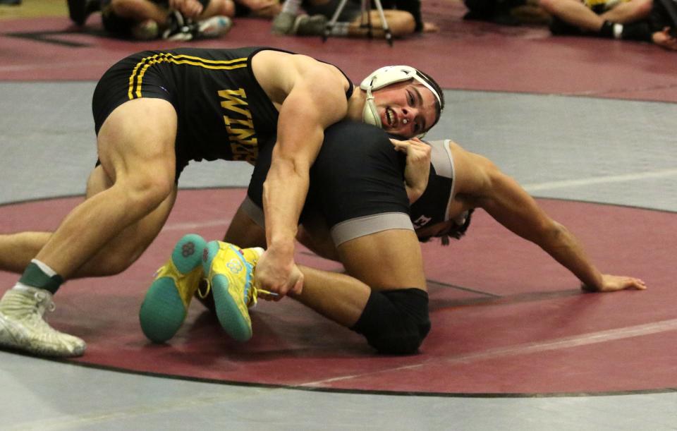 Windsor's Dominick Weaver beat Elmira's Sam Brenen-Buseck, 13-0, in the deciding match in the 172-pound weight class to take a title at the Dave Buck Memorial Wrestling Tournament at Elmira High School on Dec. 10, 2022.