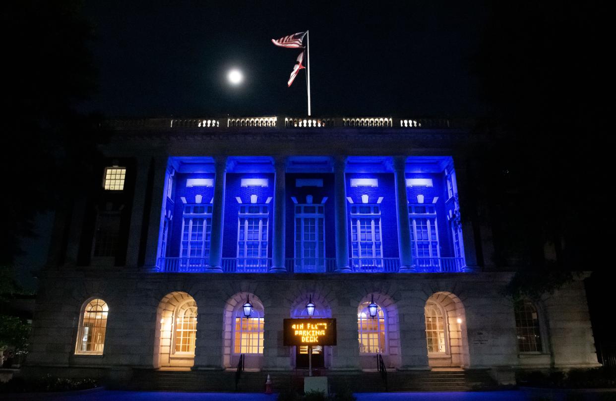Tuscaloosa municipal buildings, like City Hall, were illuminated in blue following the Thursday death of Officer Kennis Croom, a member of the Meridian, Mississippi, police department, who was killed in the line of duty. Memorial services for the 30-year-old with Tuscaloosa ties begin Thursday in Mississippi and last through Saturday, concluding with his burial at Memory Hill Gardens on Skyland Boulevard.