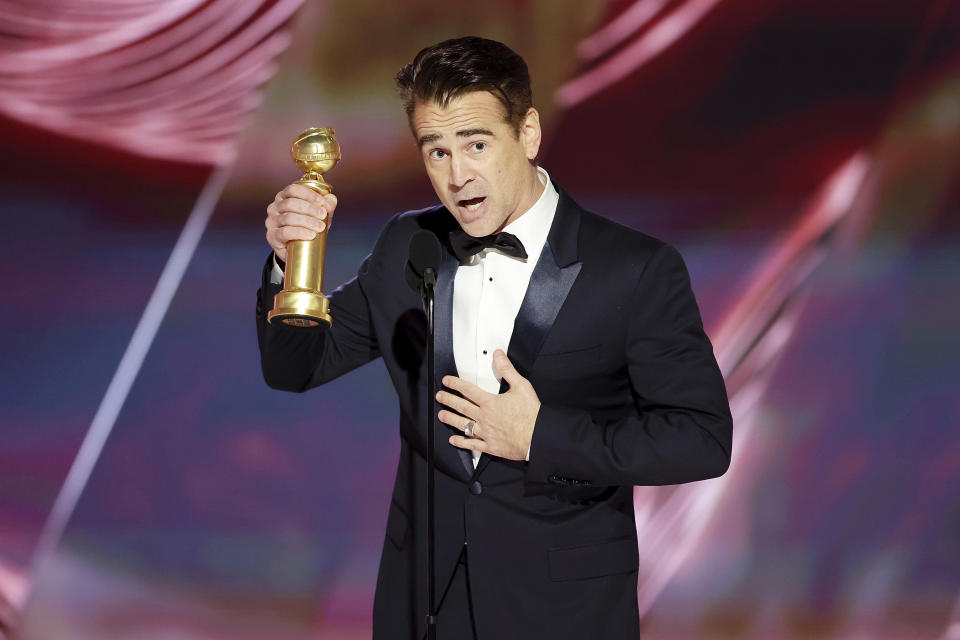 This image released by NBC shows Colin Farrell accepting the Best Actor in a Motion Picture – Musical or Comedy award for "The Banshees of Inisherin" during the 80th Annual Golden Globe Awards at the Beverly Hilton Hotel on Tuesday, Jan. 10, 2023, in Beverly Hills, Calif. (Rich Polk/NBC via AP)