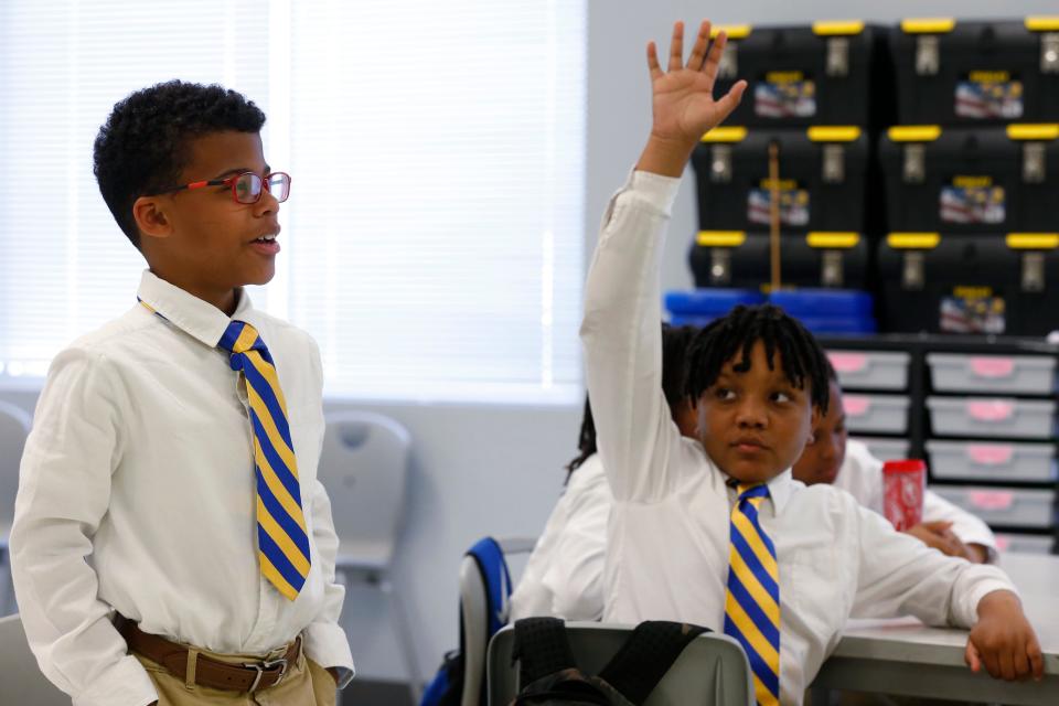 Barnett Shoals Elementary School students review what they've talked about over the school year during Boys to Men school program meeting on Thursday, May 12, 2022. The students were button-down shirts and pants along with ties to school every Thursday, to learn the importance of how a young man presents himself.