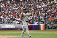Houston Astros pitcher Ronel Blanco gestures walking off the field during the sixth inning of a baseball game against the Colorado Rockies at Alfredo Harp Helu stadium in Mexico City, Saturday, April 27, 2024. (AP Photo/Fernando Llano)