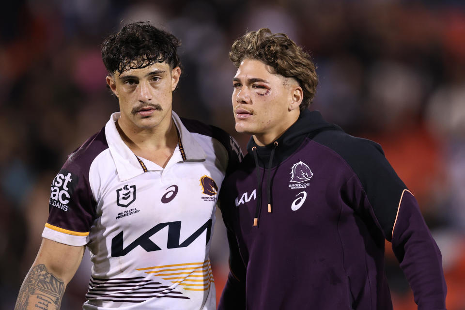 PENRITH, AUSTRALIA - MARCH 21: Kotoni Staggs and Reece Walsh of the Broncos looks dejected after a loss during the round three NRL match between Penrith Panthers and Brisbane Broncos at BlueBet Stadium on March 21, 2024 in Penrith, Australia. (Photo by Jason McCawley/Getty Images)