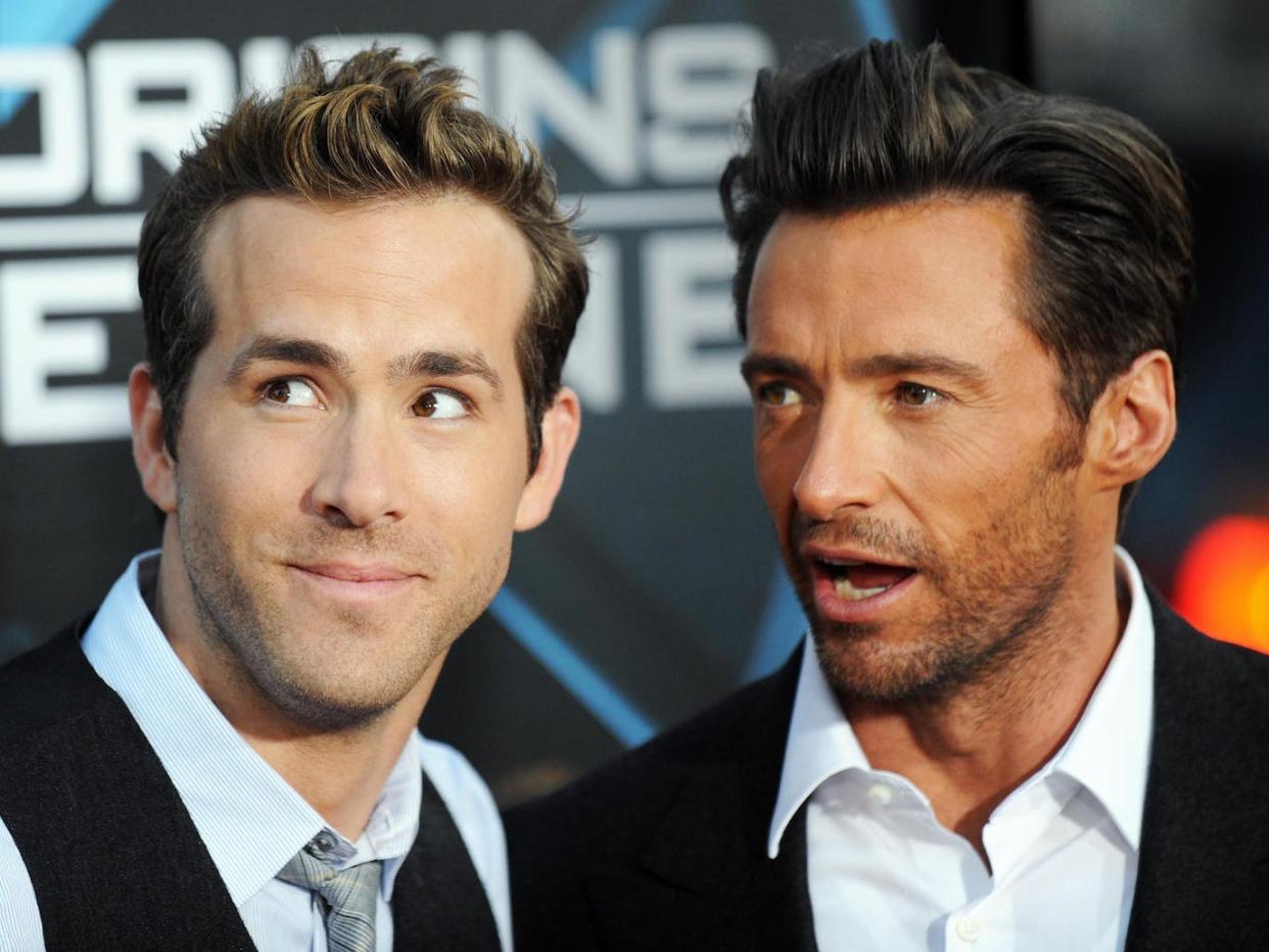 Ryan Reynolds (R) and Hugh Jackman arrive for the Los Angeles industry screening of 'X-Men Origins-Wolverine' at Grauman's Chinese Theater in Hollywood, California, on April 28, 2009.