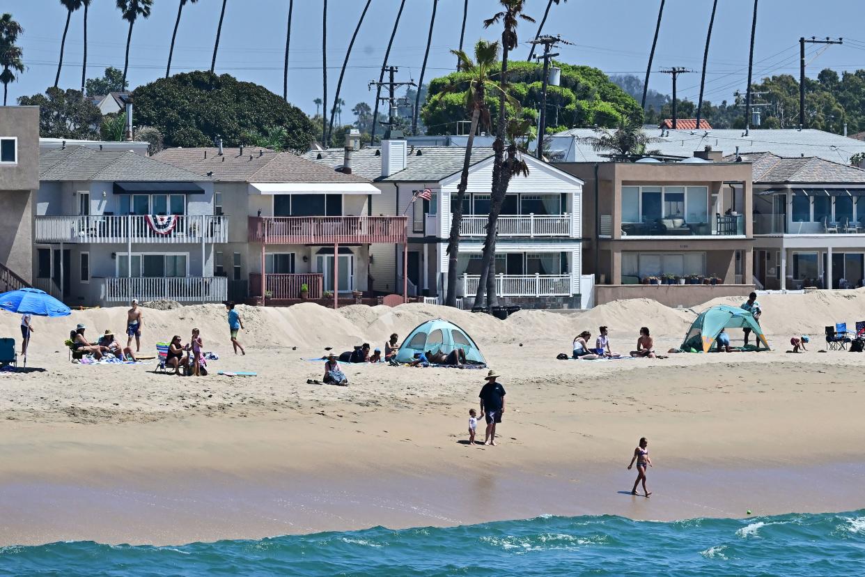 A sand berm is pictured to protect low-lying beachfront homes  in Seal Beach, California on August 18, 2023, as they prepare for hurricane Hilary. (AFP via Getty Images)