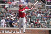 Philadelphia Phillies' Nick Castellanos (8) hits a two run home run in the fourth inning of a baseball game against the Atlanta Braves, Wednesday, Sept. 20, 2023, in Atlanta. (AP Photo/Brynn Anderson)