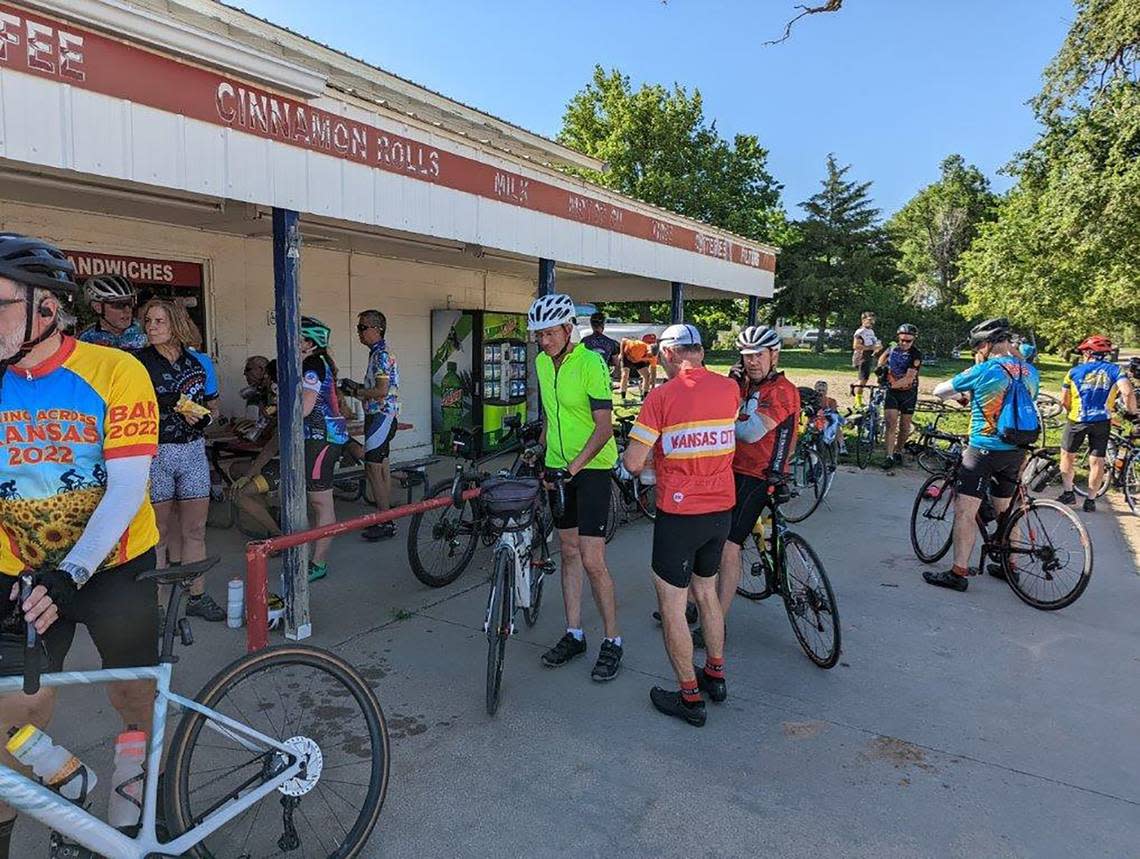 Monday-Biking across Kansas riders stop for a break at Dab Oil Company in Macksville, Kansas.