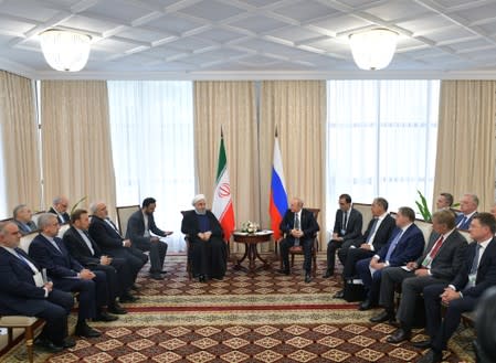 Russia's President Putin meets with Iran's President Rouhani on the sidelines of the SCO Summit in Bishkek