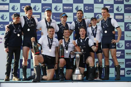 Britain Rowing - 2017 Oxford v Cambridge University Boat Race - River Thames, London - 2/4/17 The Oxford crew celebrate with the trophy after winning the men's Boat Race Action Images via Reuters / Paul Childs Livepic