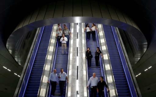 Israelis descend to the platforms of Yitzhak Navon station 80 metres (260 feet) below the streets of Jerusalem to test the new high-speed train linking the city to Ben Gurion airport