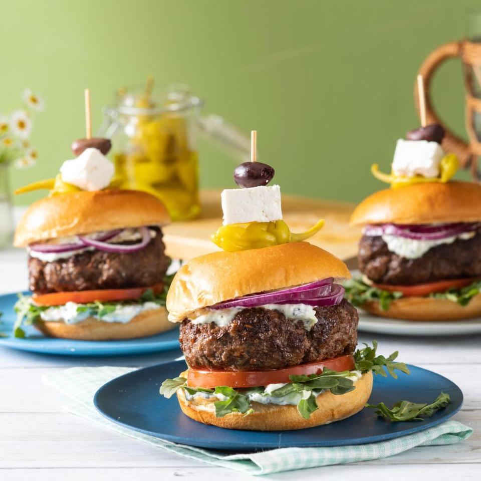 lamb burgers on bun with feta and olive on toothpick