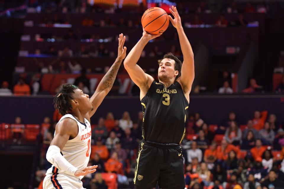 Nov 10, 2023; Champaign, Illinois, USA; Oakland Golden Grizzlies guard Jack Gohlke (3) shoots the ball over Illinois Fighting Illini guard Terrence Shannon Jr. (0) during the second half at State Farm Center. Mandatory Credit: Ron Johnson-USA TODAY Sports