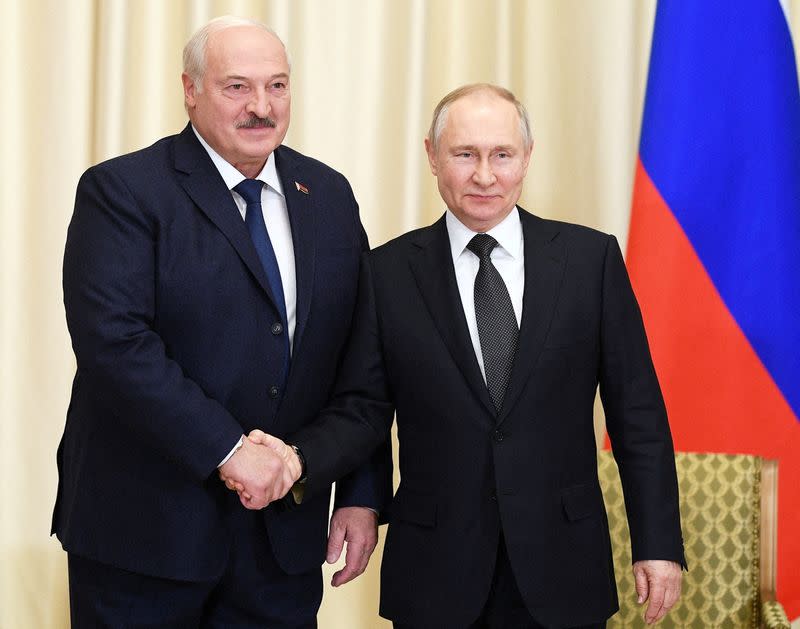 FILE PHOTO: Russian President Vladimir Putin meets with Belarusian President Alexander Lukashenko outside Moscow