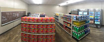 In this photo provided by Anthony Love, food and toiletries line the shelves of Linda Tutt High School's student-led free grocery store on Nov. 20, 2020, in Sanger, Texas. (Anthony Love via AP)