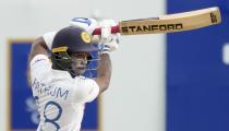 Sri Lankan batsman Pathum Nissanka plays a shot against West Indies during the day three of their second test cricket match in Galle, Sri Lanka, Wednesday, Dec. 1, 2021. (AP Photo/Eranga Jayawardena)
