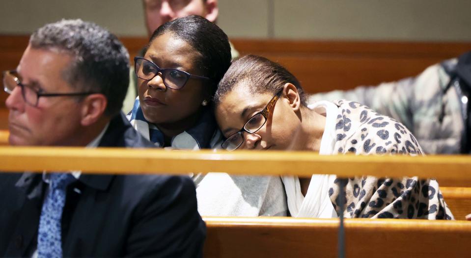The family of Erpharo Gilbert, 46, of Raynham, in Brockton District Court during the arraignment of Juan Leonardo Parra Altamirano, 33, on Thursday, April 6, 2023. Gilbert was killed in a three-vehicle hit and run crash on Route 24 in West Bridgewater on Monday, April 3.