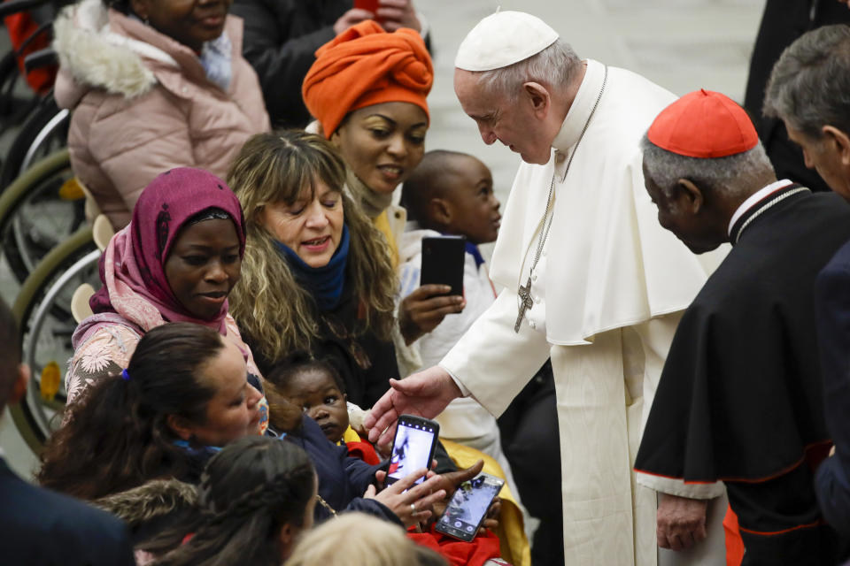 Pope Francis meets people during his weekly general audience, in Paul VI Hall at the Vatican, Wednesday, Jan. 15, 2020. (AP Photo/Alessandra Tarantino)