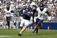 Penn State wide receiver Parker Washington (3) breaks away from Villanova defensive back Jalen Goodman (7) to score a first quarter touchdown during an NCAA college football game in State College, Pa., on Saturday, Sept. 25, 2021. (AP Photo/Barry Reeger)