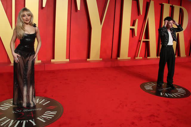 <p>Matt Baron/BEI/Shutterstock</p> Barry Keoghan and Sabrina Carpenter attend the 2024 Vanity Fair Oscars party.