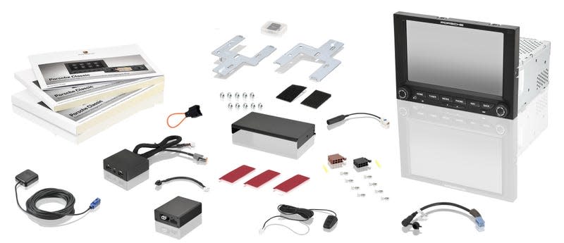 The components of the Porsche Classic Communication Management System Plus on a white background.