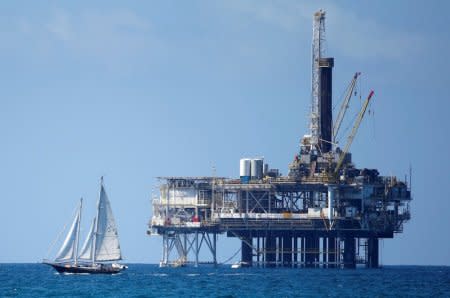 FILE PHOTO: An offshore oil platform is seen in Huntington Beach, California, U.S., September 28, 2014.   REUTERS/Lucy Nicholson/File Photo