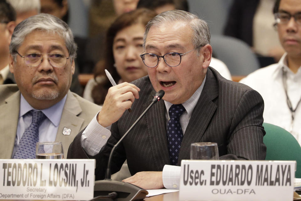 Philippine Secretary of Foreign Affairs Teodoro Locsin Jr. gestures during a senate hearing in Manila, Philippines on Thursday, Feb. 6, 2020. The Philippine foreign secretary warned Thursday that abrogating a security accord with Washington would undermine his country's security and foster aggression in the disputed South China Sea. (AP Photo/Aaron Favila)