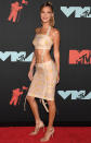 For the VMAs red carpet in August 2019, the supermodel showed off her slim figure in a flesh-colored two-piece dress from Charlotte Knowles London.